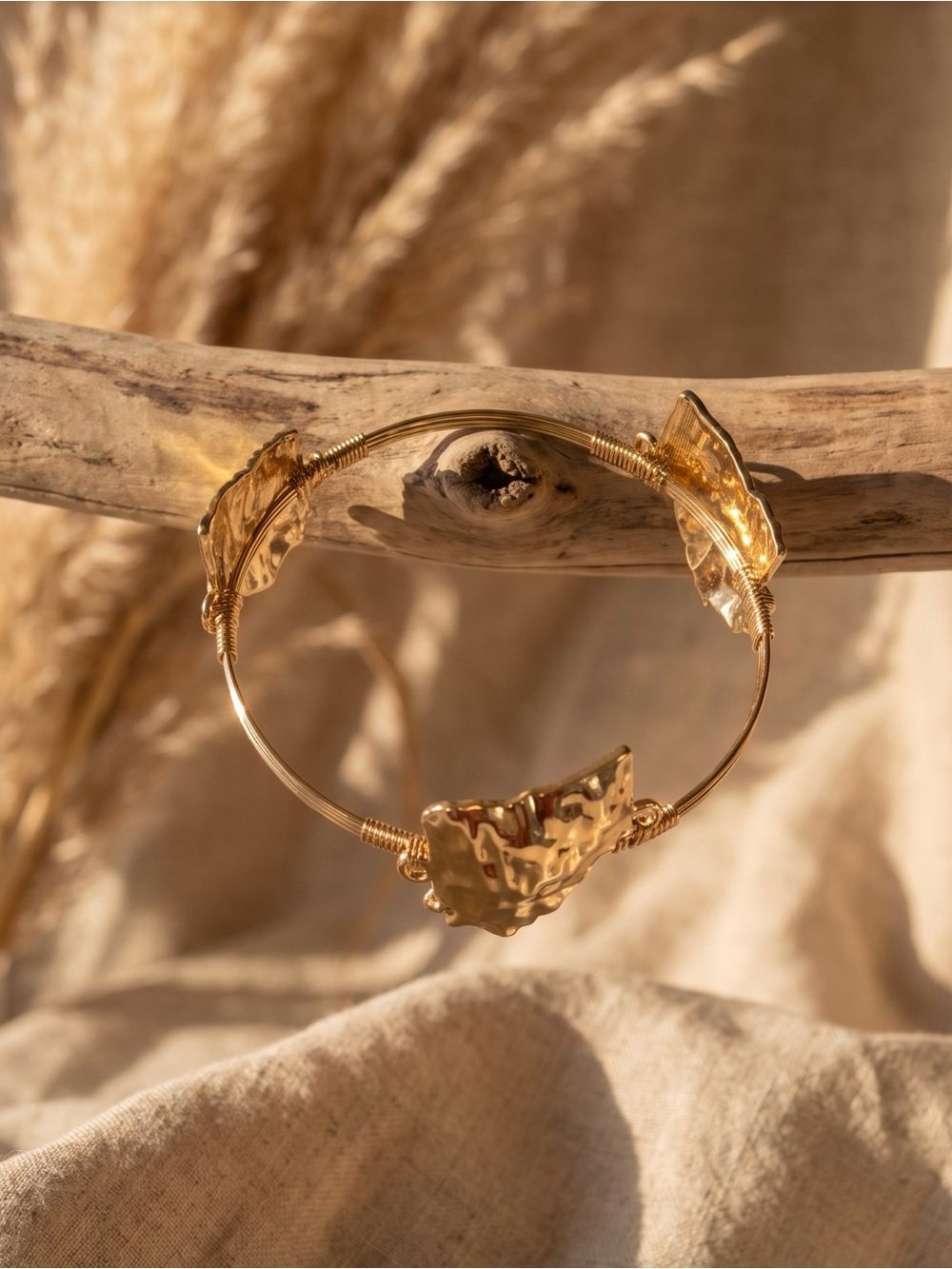 Gold tone Leaf Accent Bangle Bracelet